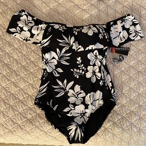 Black and white one piece bathing suit with optional straps